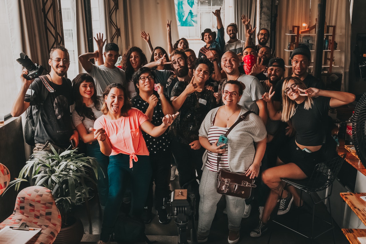 group of people smiling to the camera